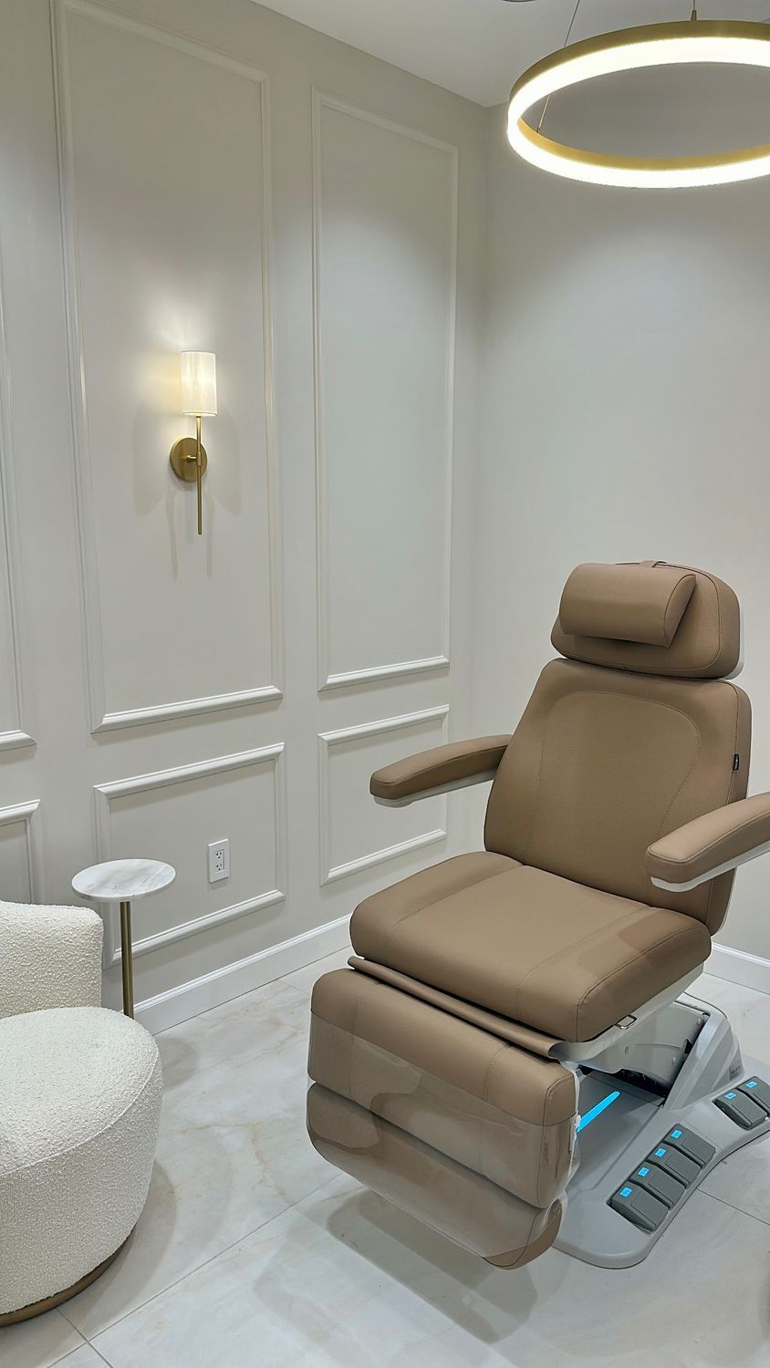 Modern treatment room with brown reclining chair