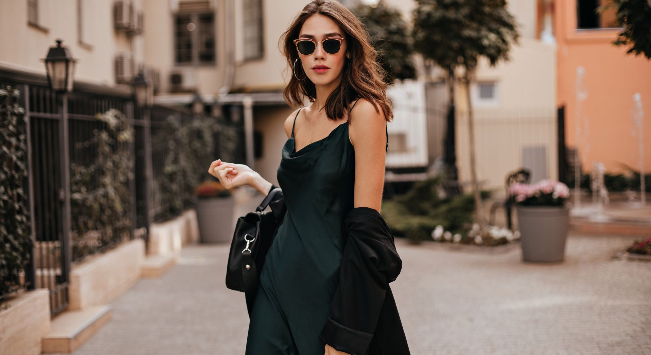 manhattan specialty packages model with sunglasses